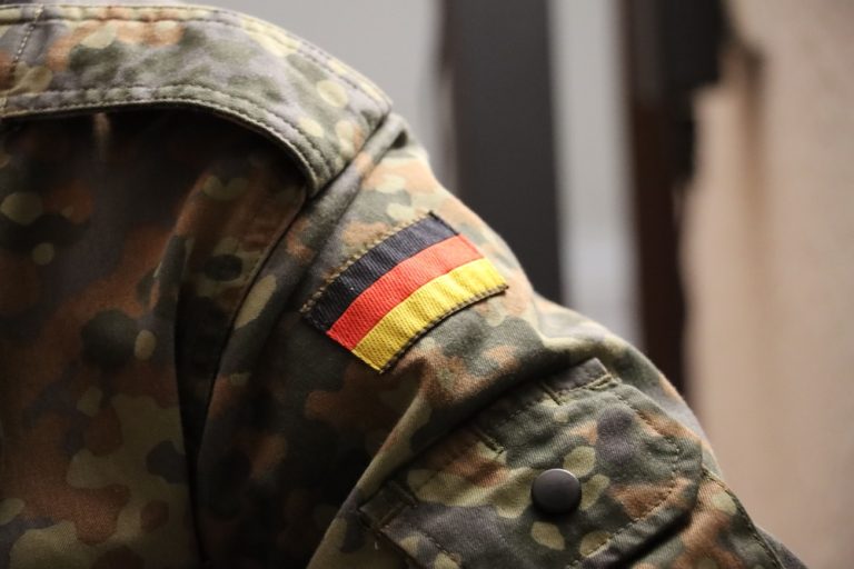 Germany moves to clarify overseas-travel rules for military-age men